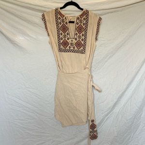 Free people embroidered wrap dress.